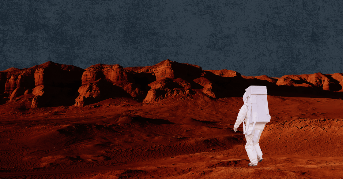 An astronaut walks on Mars